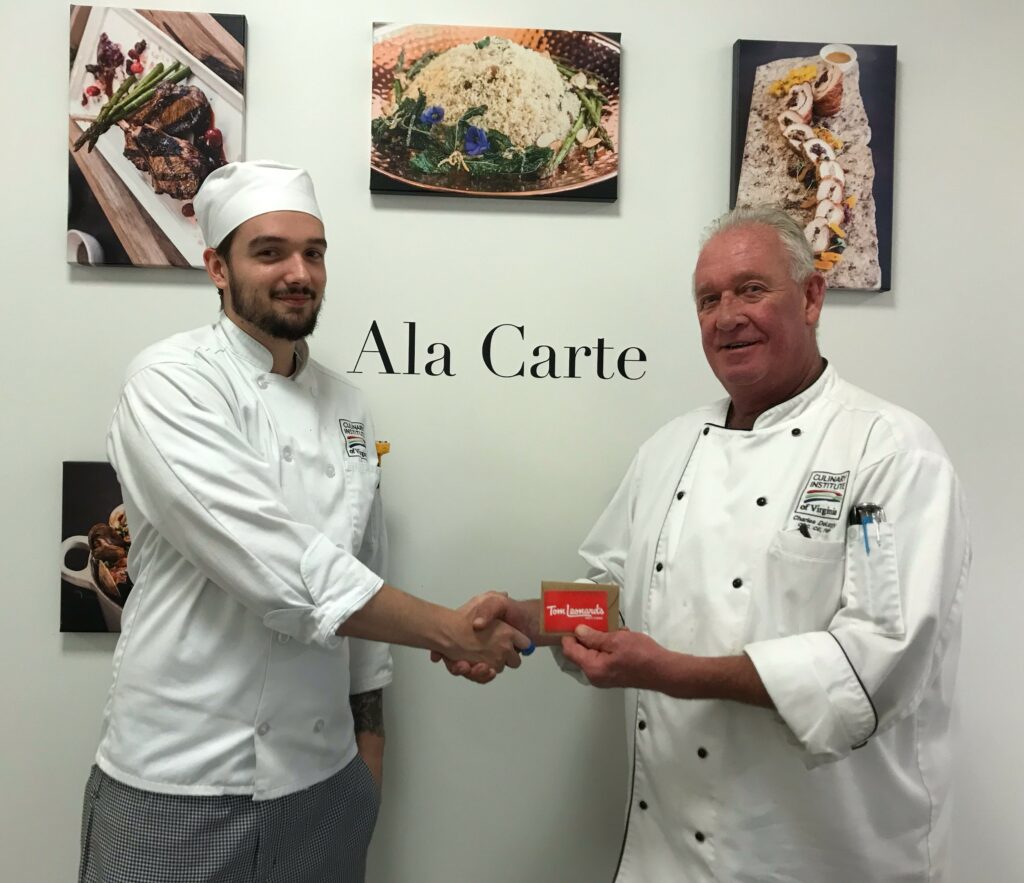 Alex Tashe receives gift card from Chef Delargy.